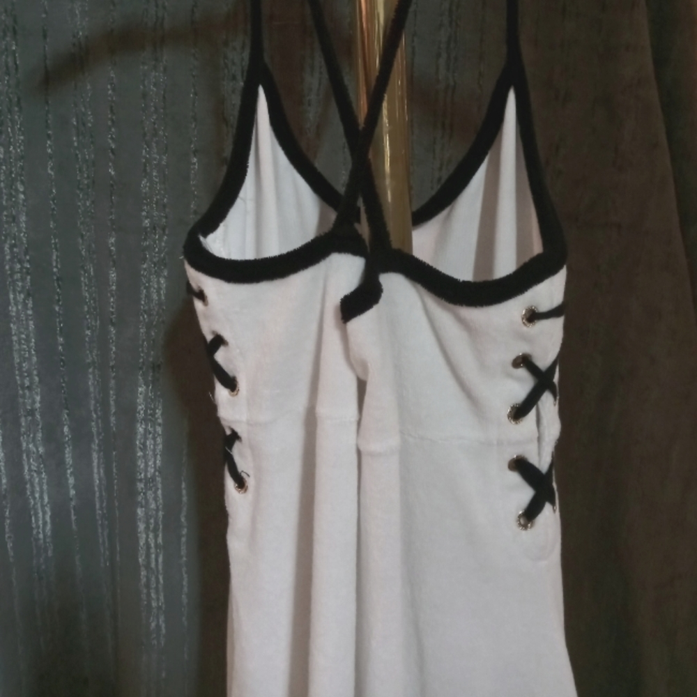 White dress with black crisscross straps. Cotton